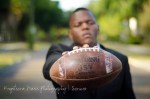 Senior Portrait boy holding football