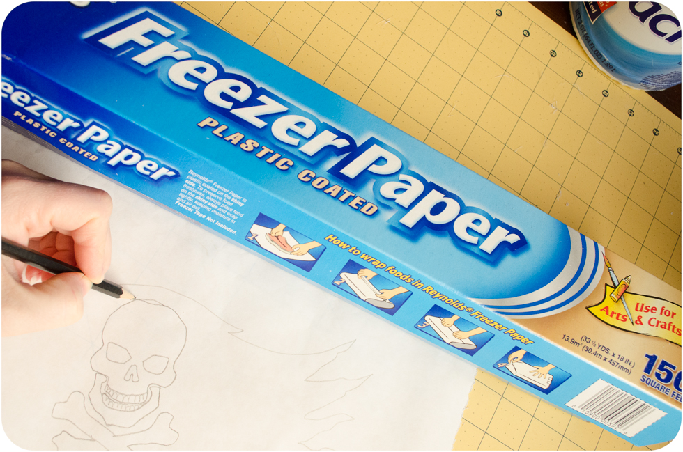 Drawing pirate flag on freezer paper with pencil